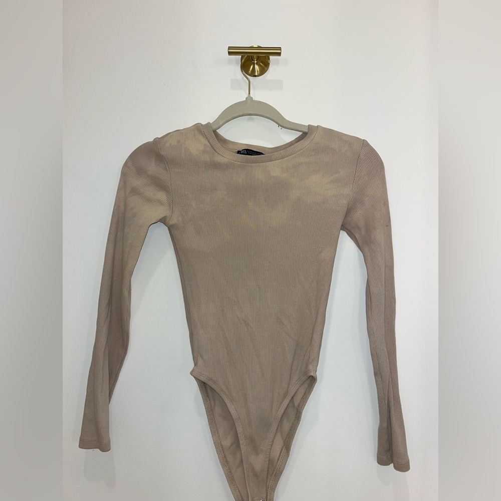 nude, slight tie dye , long sleeve body suit